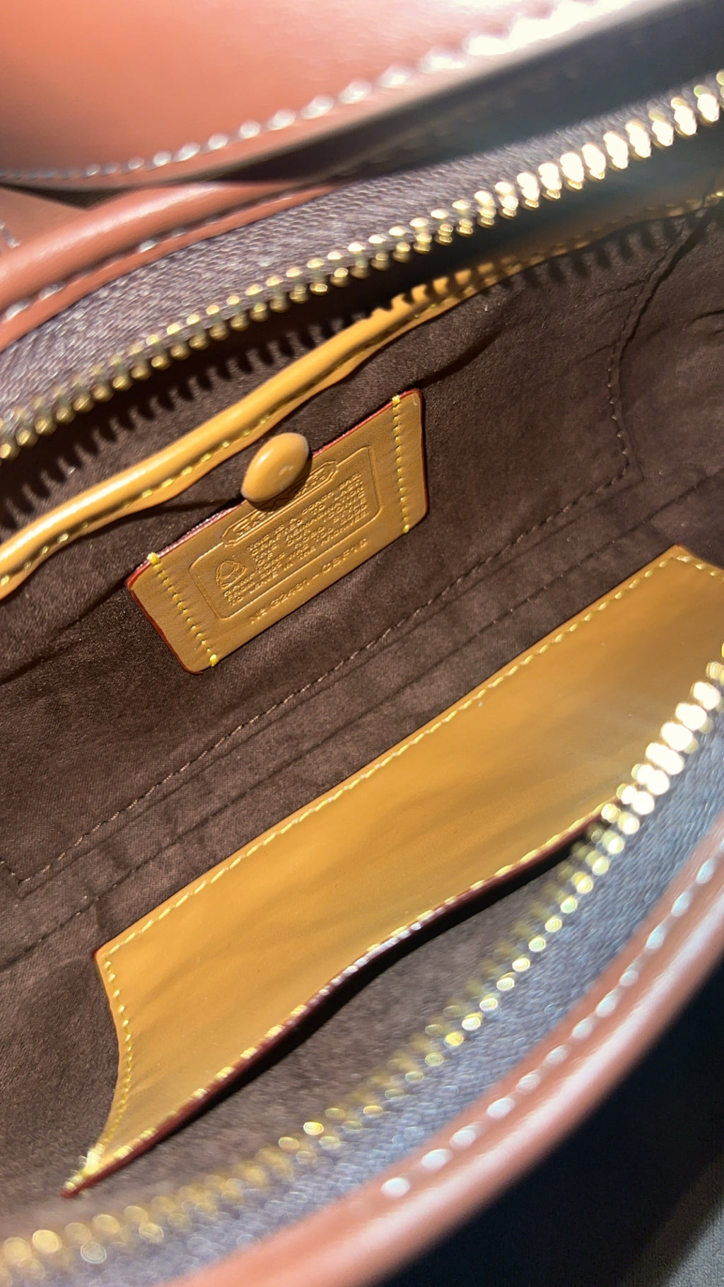 Signature jacquard canvas in a beige/taupe and brown pattern