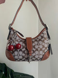 Hampton Hobo Signature Rhinestone jacquard canvas in a beige/tan