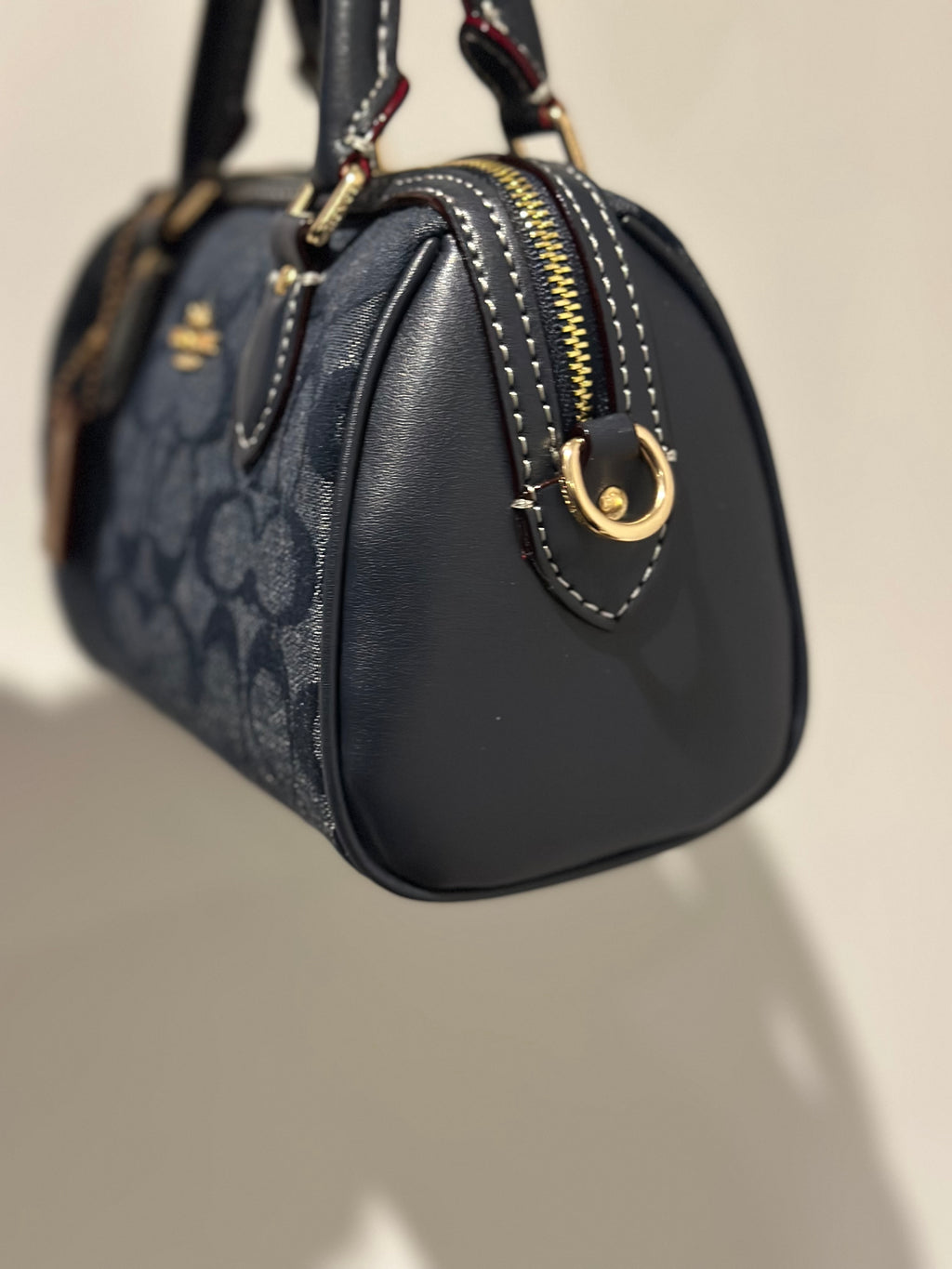 Mini Rowan Satchel in the classic Signature canvas in Denim blue Cross body strap