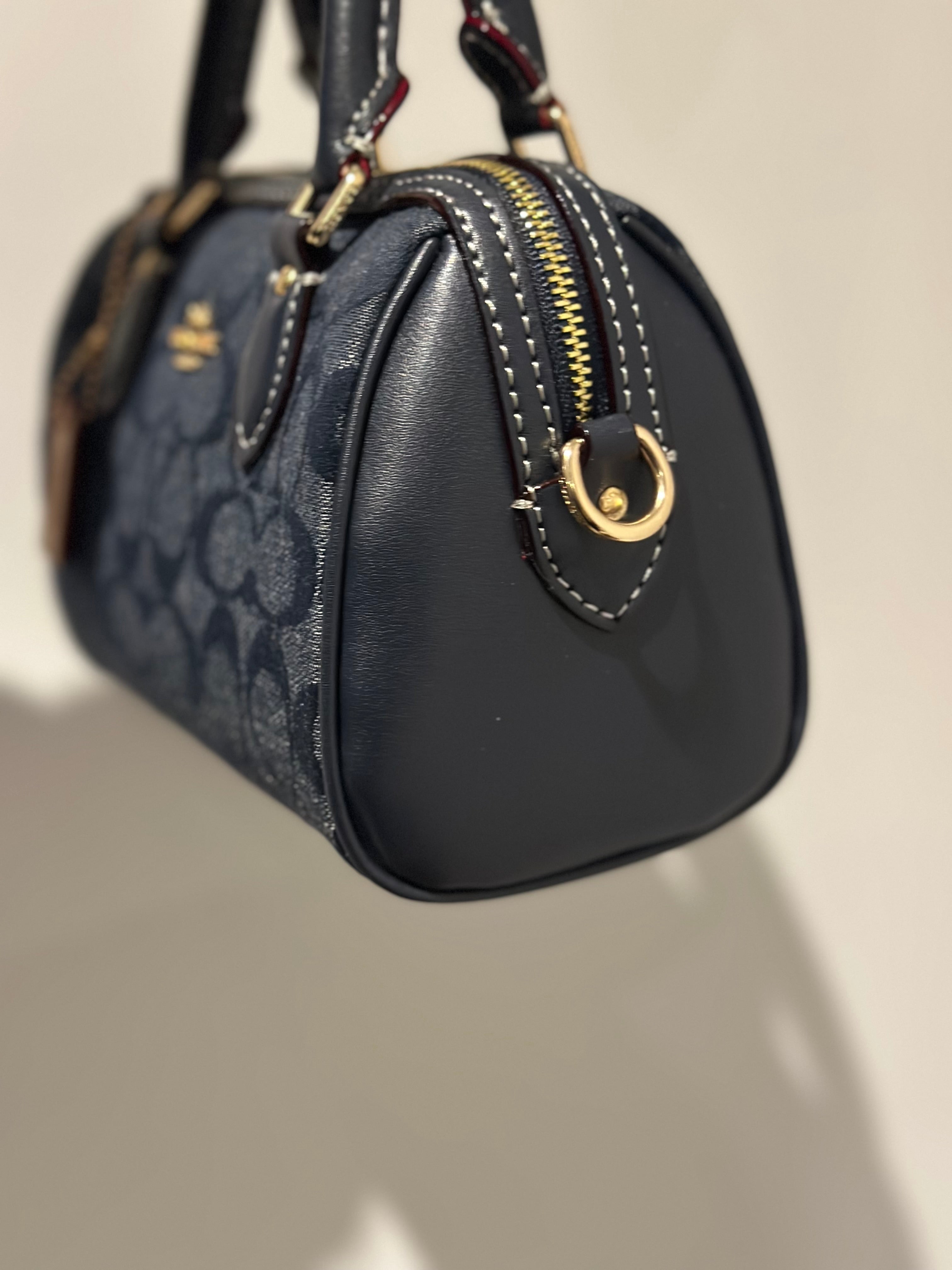 Mini Rowan Satchel in the classic Signature canvas in Denim blue Cross body strap