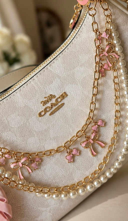 Pink chain bag gold charm accessories bow