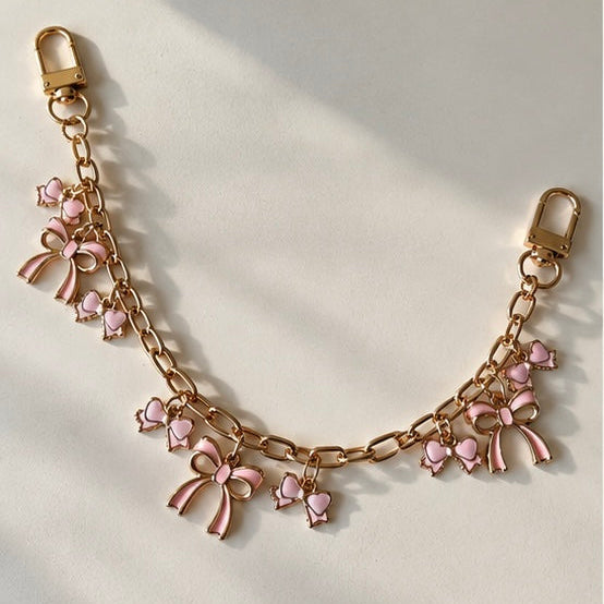 Pink chain bag gold charm accessories bow